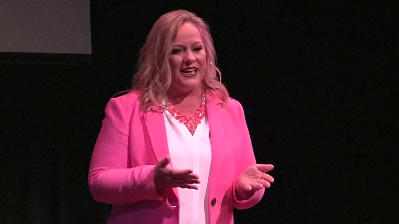 Dr. Silvia Mah on the TEDxChulaVista stage — Getting to Even